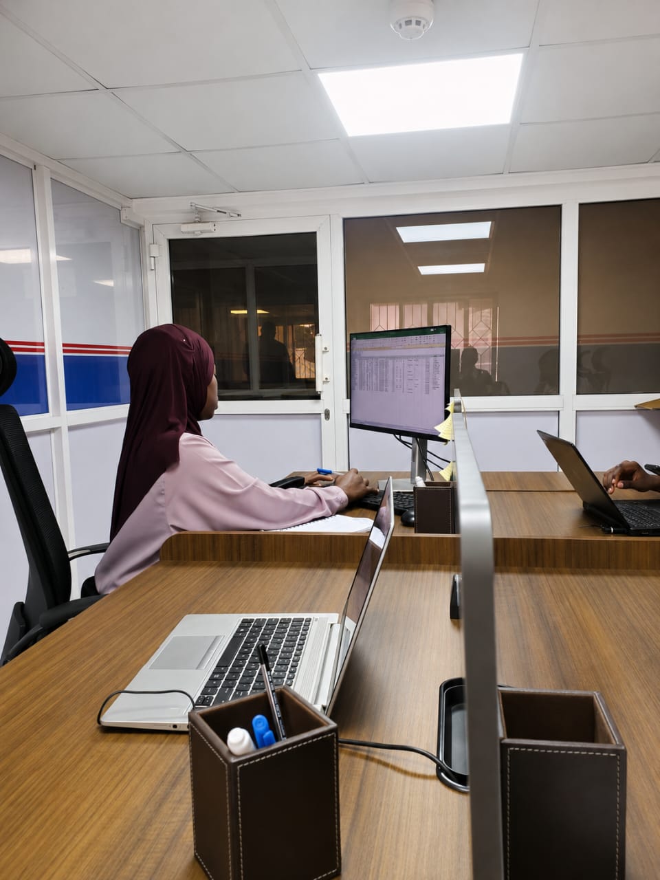 Mbeya One WATUSIMU device financing team
